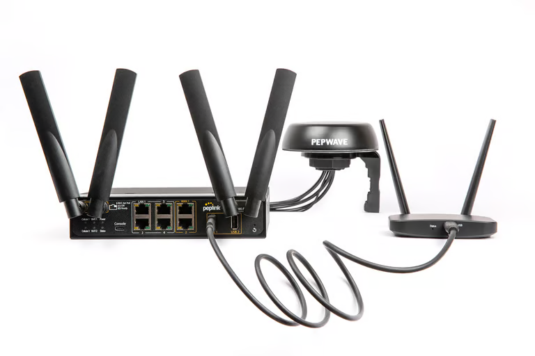MBX Mini 5G router rear panel showing ethernet ports, USB ports, and power connections